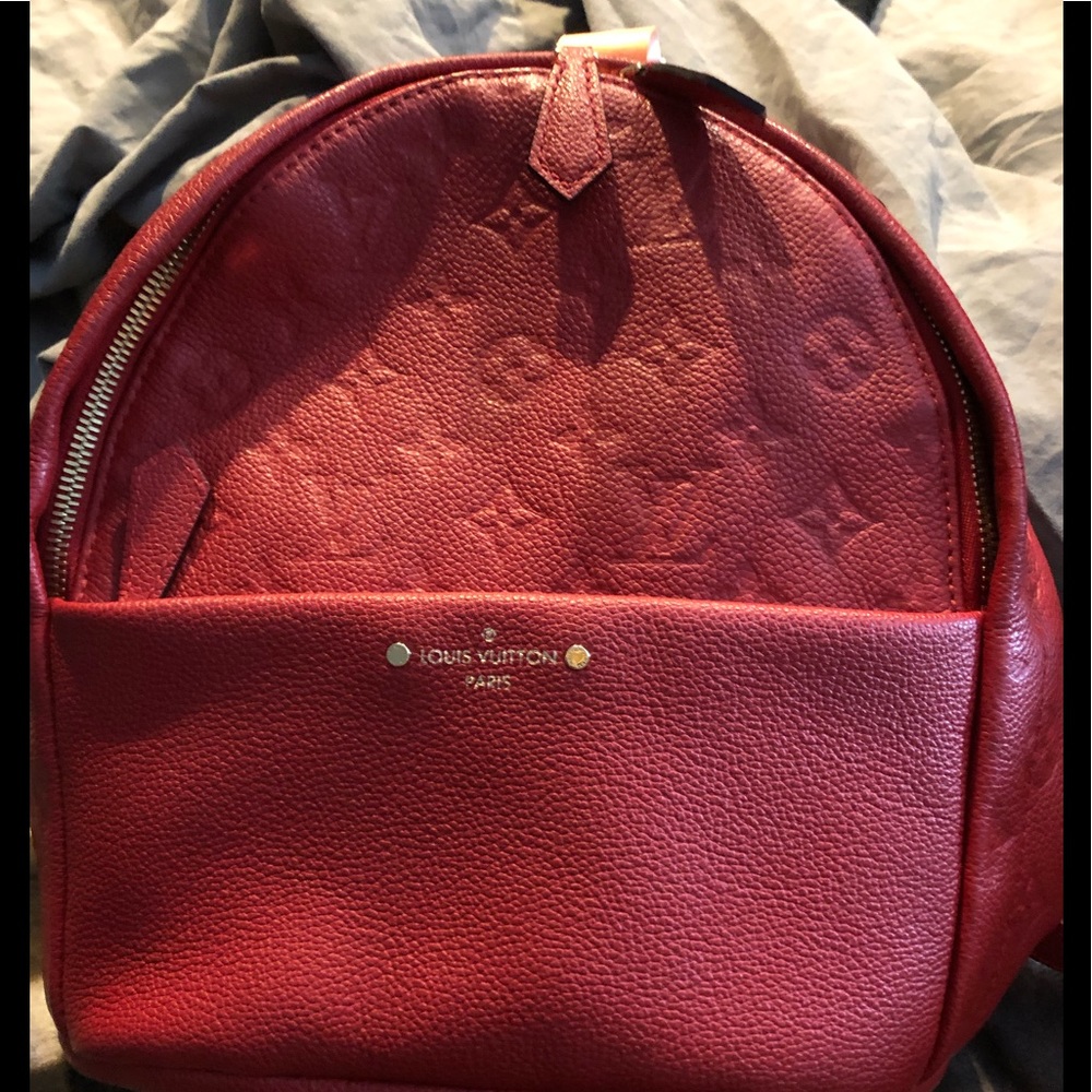 LOUIS VUITTON MONOGRAM EMPREINTE. RED